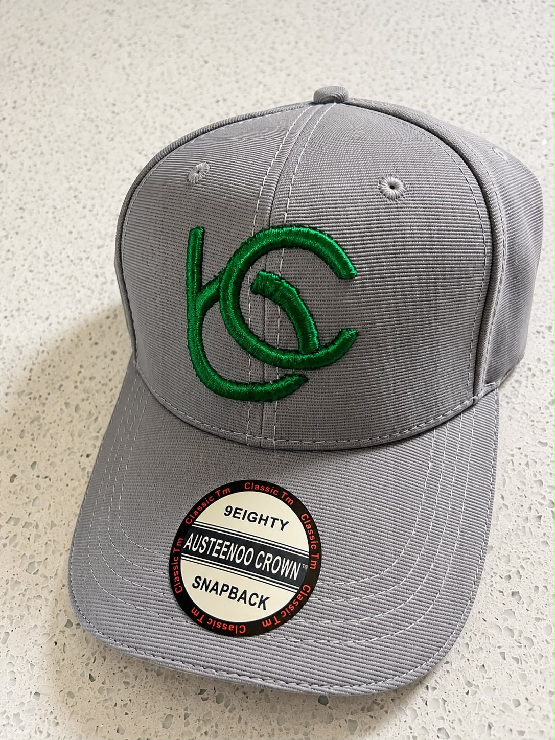 Gray face cap